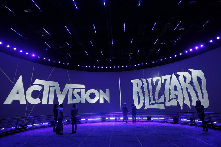 ASSOCIATED PRESS / 2013
                                The Activision Blizzard Booth is shown during the Electronic Entertainment Expo in Los Angeles.