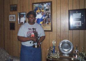 THE DELTA DEMOCRAT-TIMES VIA AP
                                Lusia Harris Stewart shows off some of her medals and awards from her basketball career in her home in Greenwood, Miss, in 2002.
