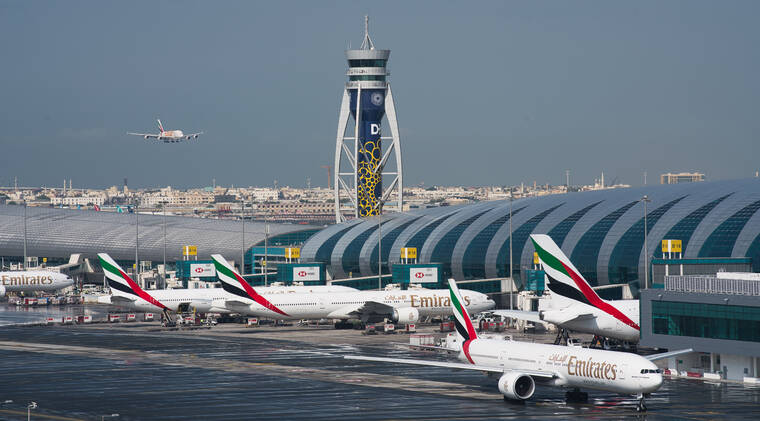 ASSOCIATED PRESS
                                An Emirates jetliner came in for a landing at the Dubai International Airport in Dubai, United Arab Emirates, in December 2019. Airlines across the world, including the long-haul carrier Emirates, rushed Wednesday, to cancel or change flights heading into the U.S. over an ongoing dispute about the rollout of 5G mobile phone technology near American airports.