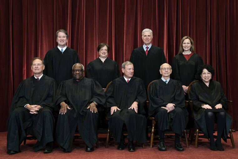 ERIN SCHAFF/NEW YORK TIMES VIA AP, POOL / 2021
                                Members of the Supreme Court pose for a group photo at the Supreme Court in Washington. Seated from left are Associate Justice Samuel Alito, Associate Justice Clarence Thomas, Chief Justice John Roberts, Associate Justice Stephen Breyer and Associate Justice Sonia Sotomayor, while standing from left are Associate Justice Brett Kavanaugh, Associate Justice Elena Kagan, Associate Justice Neil Gorsuch and Associate Justice Amy Coney Barrett.