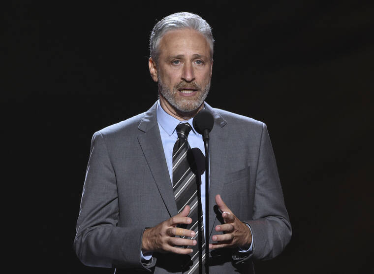 PHIL MCCARTEN/INVISION/AP / 2018
                                Jon Stewart presents the Pat Tillman award for service at the ESPY Awards in Los Angeles. Stewart has been named the 23rd recipient of the Kennedy Center’s Mark Twain Award for lifetime achievement in comedy.