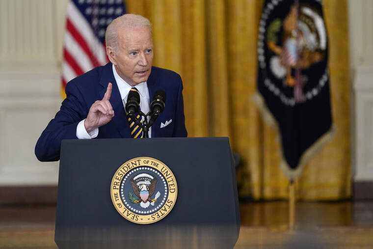 ASSOCIATED PRESS
                                President Joe Biden speaks during a news conference in the East Room of the White House in Washington.