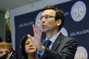 ASSOCIATED PRESS
                                Washington Attorney General Bob Ferguson talked to reporters, in August 2019, during a news conference in Seattle. In a 5-4 decision today, the Washington Supreme Court upheld an $18 million campaign finance penalty against the Consumer Brands Association, formerly known as the Grocery Manufacturers Association.
