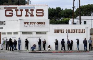 ASSOCIATED PRESS / 2020
                                People wait in a line to enter a gun store in Culver City, Calif.