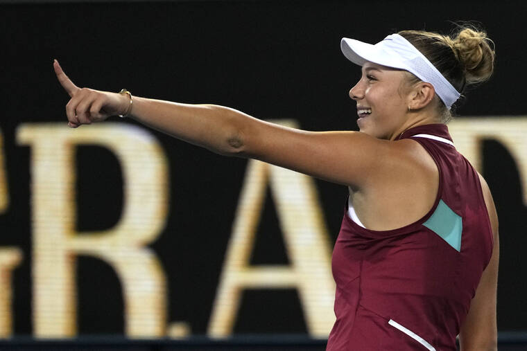 ASSOCIATED PRESS
                                Amanda Anisimova of the U.S. celebratef after defeating Naomi Osaka of Japan in their third-round match at the Australian Open tennis championships in Melbourne, Australia, Friday.