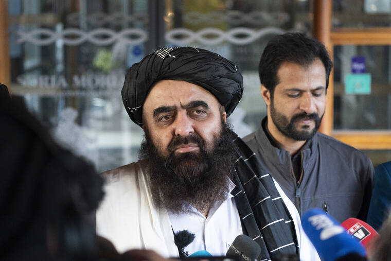 TERJE PEDERSEN/NTB SCANPIX VIA AP
                                Afghan Foreign Minister Amir Khan Muttaqi meets the media outside the Soria Moria hotel in Oslo, Norway. The Taliban and western diplomats have began their first official talks in Europe since they took over control of Afghanistan in August. The closed-door meetings were taking place at a hotel in the snow-capped mountains above the Norwegian capital and Taliban representatives will be certain to press their demand that nearly $10 billion frozen by the United States and other Western countries be released as Afghanistan faces a precarious humanitarian situation.