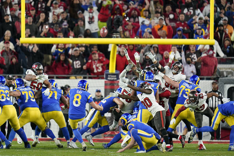 ASSOCIATED PRESS
                                Los Angeles Rams’ Matt Gay (8) kicks a 30-yard field goal to defeat the Tampa Bay Buccaneers during the second half of an NFL divisional round playoff football game today in Tampa, Fla.