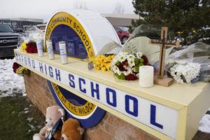 ASSOCIATED PRESS / DECEMBER 2021
                                Memorial items are shown on the sign of Oxford High School in Oxford, Mich. Officials planned to welcome students back to Oxford High School on Monday, Jan. 24, which is reopening for the first time since four students were killed and six students and a teacher were injured during a shooting at the school on Nov. 30. The students have been attending classes at other buildings since Jan. 10. A fellow student, Ethan Crumbley, 15, is charged with murder and other crimes. His parents also are facing charges.