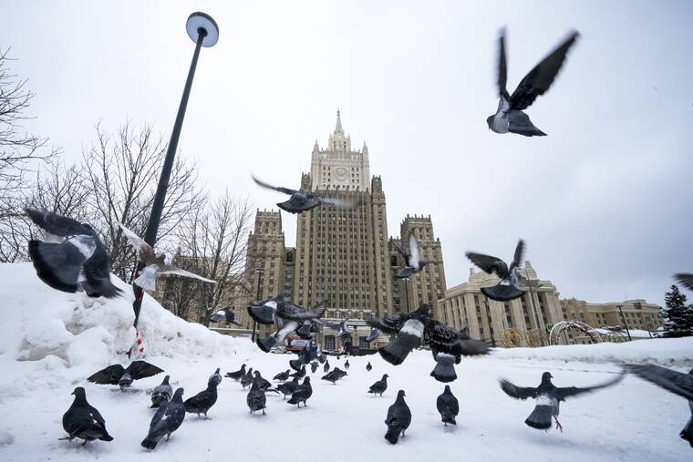 ASSOCIATED PRESS
                                Pigeons took off in front of the Russian Foreign Ministry building in Moscow, Russia, Wednesday. Russian Foreign Minister Sergey Lavrov said he and other top officials will advise President Vladimir Putin on the next steps after receiving written replies from the United States to the demands.