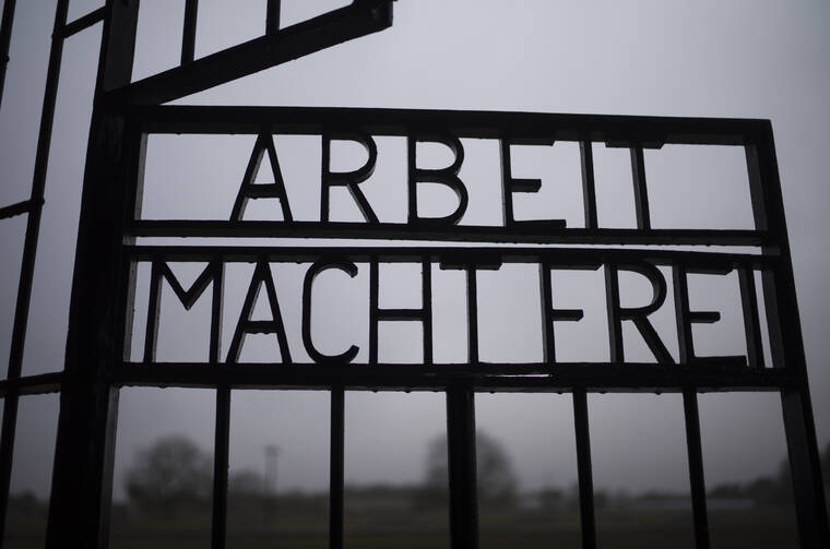 ASSOCIATED PRESS
                                The gate of the Sachsenhausen Nazi death camp with the phrase ‘Arbeit macht frei’ (work sets you free) stood open in Oranienburg, about 18 miles north of Berlin, Germany, Jan. 25. The International Holocaust Remembrance Day marked the liberation of the Auschwitz Nazi death camp on Jan. 27, 1945.