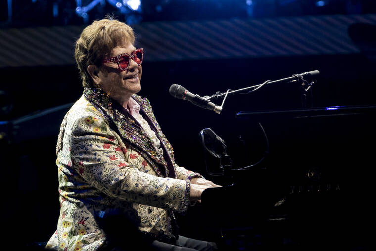 ASSOCIATED PRESS
                                Elton John performs during his “Farewell Yellow Brick Road” tour on Jan. 19 in New Orleans. Despite being vaccinated and boosted, John has contracted COVID-19 and is postponing two farewell concert dates in Dallas. John “is experiencing only mild symptoms,” according to a statement.