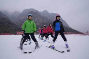 ASSOCIATED PRESS / DEC. 23
                                School children learning to ski take to the slope at the Vanke Shijinglong Ski Resort in Yanqing on the outskirts of Beijing, China.