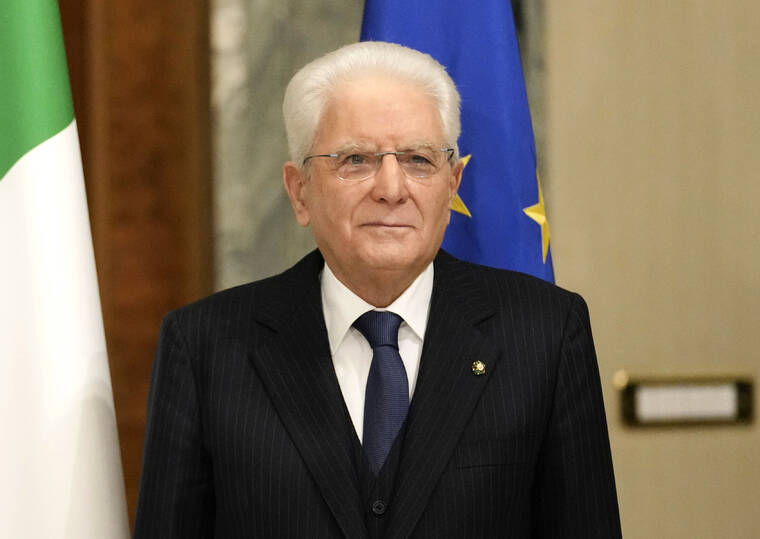 POOL PHOTO / AP
                                Italian President Sergio Mattarella stands with French President Emmanuel Macron at Quirinale Presidential Palace in Rome, Nov. 25.