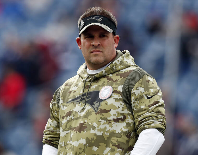 ASSOCIATED PRESS
                                New England Patriots offensive coordinator Josh McDaniels looks on prior to an NFL football game Nov. 14 in Foxborough, Mass.