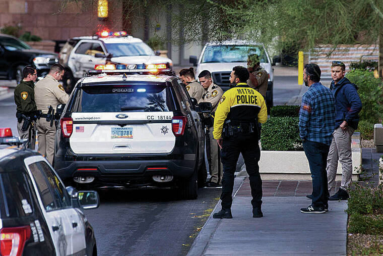 Bizuayehu Tesfaye / Las Vegas Review-Journal
                                Las Vegas metropolitan police investigated a robbery and shooting Friday in the parking garage of the Fashion Show Mall on the Las Vegas Strip.