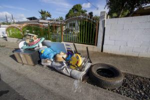 STAR-ADVERTISER 
                                Bulky trash items along Hiapo St. and Waipahu St. in Waipahu waited for pickup by the city.