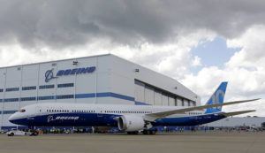 ASSOCIATED PRESS / 2017
                                Boeing employees stand near the new Boeing 787-10 at the company’s facility in North Charleston, S.C.