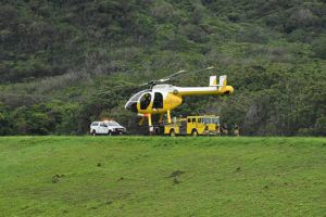 STAR-ADVERTISER / 2020
                                HFD helicopter takes off from Nuuanu Reservoir during rescue operation.