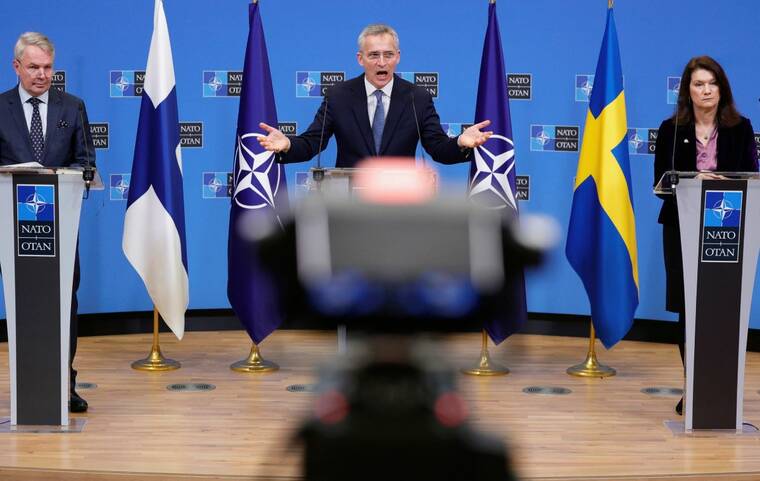 ASSOCIATED PRESS
                                NATO Secretary General Jens Stoltenberg, center, participated in a media conference with Finland’s Foreign Minister Pekka Haavisto, left, and Sweden’s Foreign Minister Ann Linde, right, at NATO headquarters in Brussels, today.