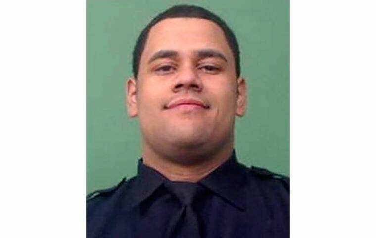 COURTESY OF NYPD VIA ASSOCIATED PRESS
                                NYPD Officer Wilbert Mora, who was involved in a police shooting, Friday, in New York City, is shown in an undated photo. Officer Mora, gravely wounded in a Harlem shooting that took his partner’s life last week, has also died of his injuries, police Commissioner Keechant Sewell said today.