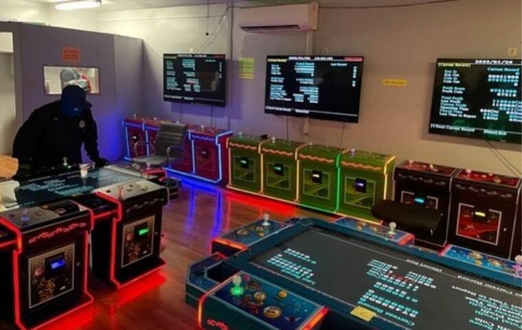 HONOLULU POLICE DEPARTMENT
                                Honolulu police seized 16 gambling machines and cash during a raid at an illegal game room in Liliha Tuesday night.