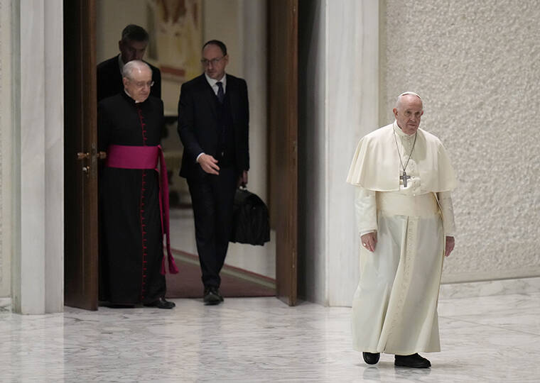 ASSOCIATED PRESS / JAN. 26
                                Pope Francis walks to reach his chair as he arrives for his weekly general audience in the Paul VI Hall, at the Vatican.