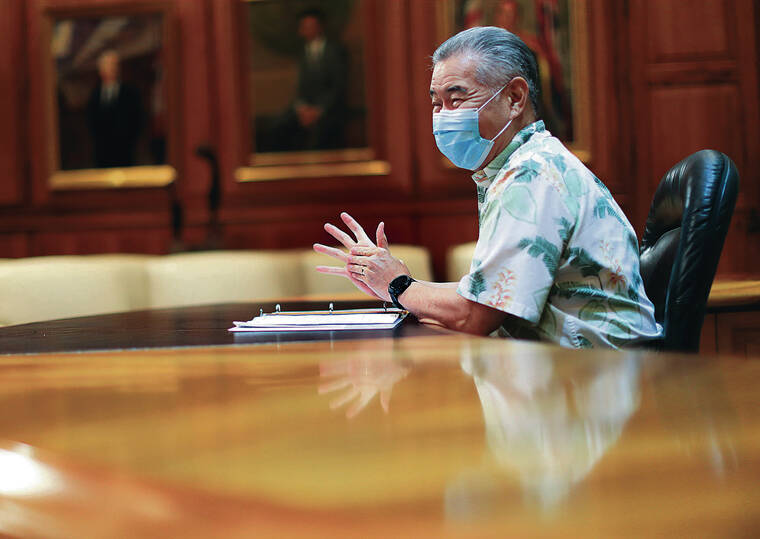 STAR-ADVERTISER
                                Gov. David Ige spoke during an interview inside the executive office of the state Capitol in October 2020.