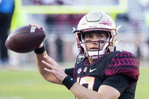 ASSOCIATED PRESS
                                Florida State quarterback McKenzie Milton stays warm while the defense is on the field during a game on Nov. 6.