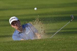 ASSOCIATED PRESS
                                Russell Henley hits out of the 13th bunker during the third round of the Sony Open.