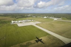NEW ZEALAND DEFENCE FORCE VIA AP
                                In this photo provided by the New Zealand Defence Force, a shadow of a Hercules aircraft is cast on the ground as it arrives at Tonga’s Fuaʻamotu International Airport, near Nukuʻalofa today.