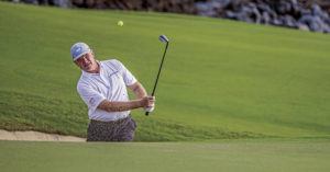 Ernie Els chips onto the 17th green during the opening round of the Mitsubishi Electric Championship PGA Tour Champions golf tournament Thursday, Jan. 20, 2022, at Hualalai in Ka'upulehu-Kona, Hawaii.  (Tom Linder/West Hawaii Today via AP)