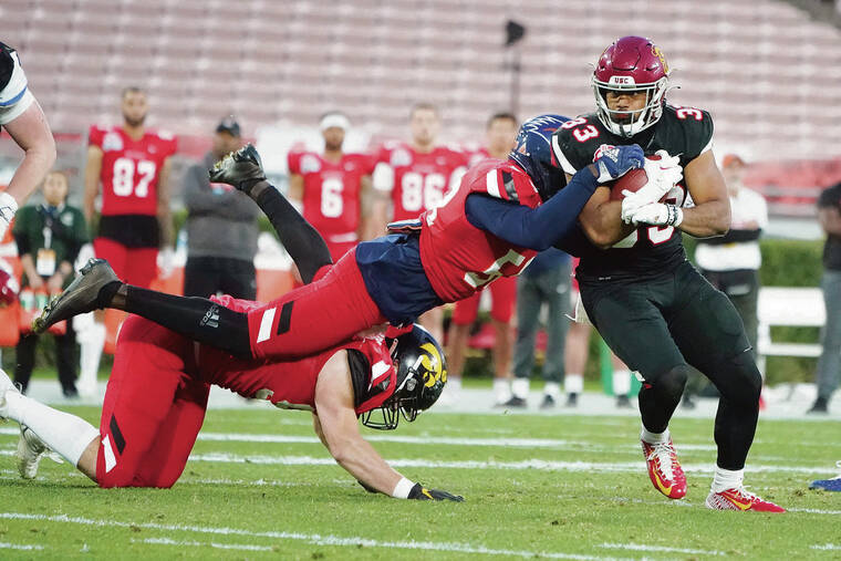 ASSOCIATED PRESS
                                American Team running back Vavae Malepeai, who graduated from Mililani, scored a touchdown on Saturday.