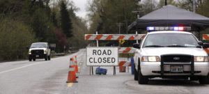 ASSOCIATED PRESS / 2014
                                A Washington State Patrol vehicle staffs the closure westbound of Highway 530 near Darrington, Wash.