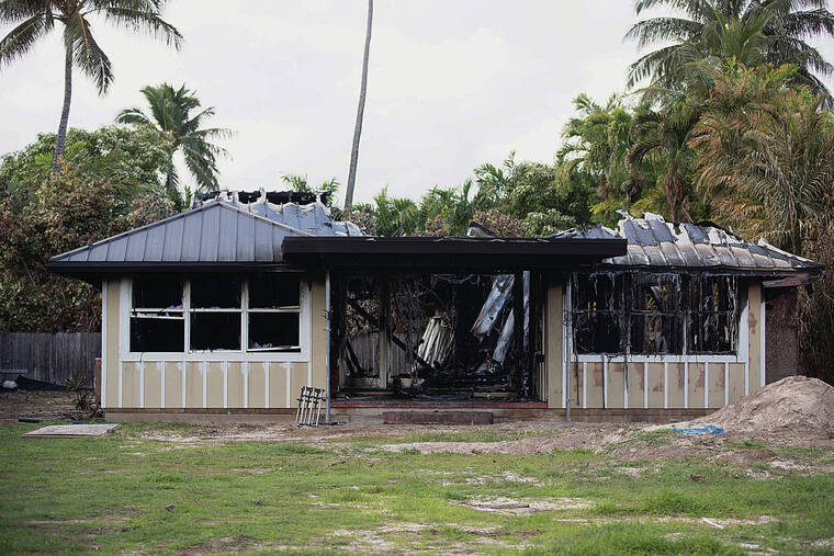 GEORGE F. LEE / GLEE@STARADVERTISER.COM
                                The wooden structure located at 118 Kaiolena Drive was destroyed by fire.