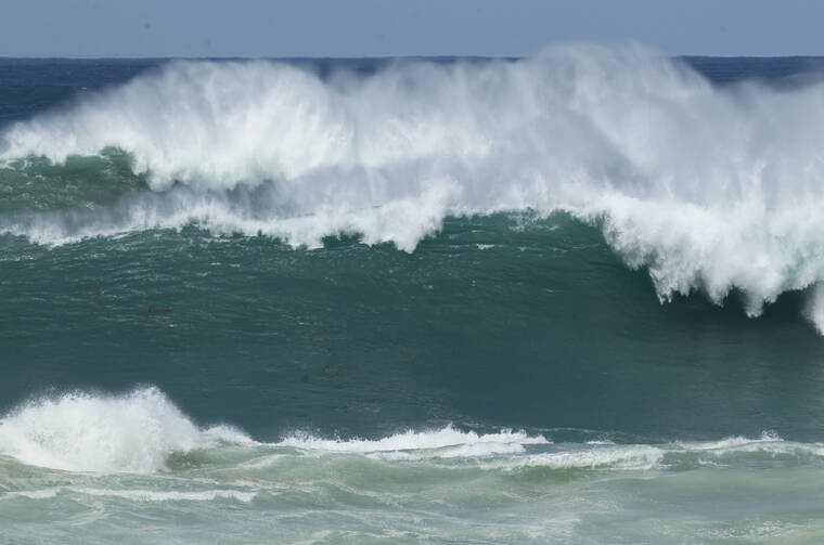 STAR-ADVERTISER / FEBRUARY 2016
                                Large waves rolled into Waimea Bay during a large northwest swell.