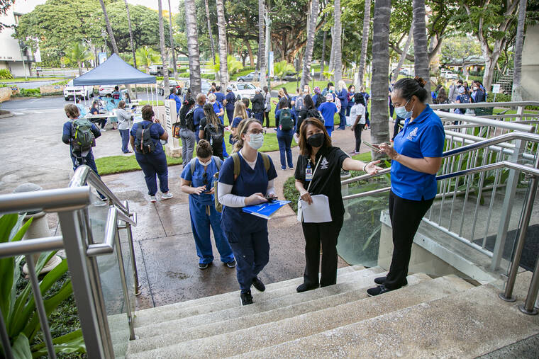 PHOTO COURTESY THE QUEEN’S HEALTH SYSTEMS
                                More than 100 health care personnel, including traveling nurses, respiratory therapists and a radiologic technologist, arrived over the weekend to help at The Queen’s Medical Center-Punchbowl and QMC-West. Most are funded by FEMA.