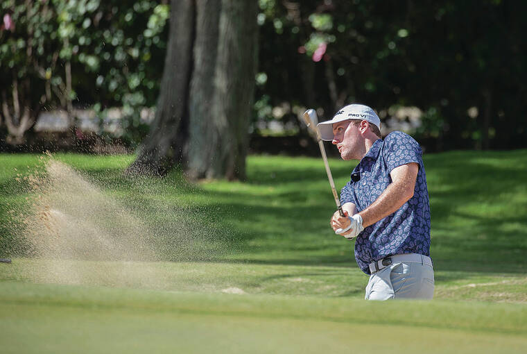 CINDY ELLEN RUSSELL / CRUSSELL@STARADVERTISER.COM
                                Russell Henley blasted a bunker shot from 66 feet to within 3 feet on the sixth hole on Friday at the Sony Open. He parred the hole.