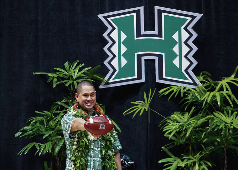 CINDY ELLEN RUSSELL / CRUSSELL@STARADVERTISER.COM
                                The University of Hawaii formally introduced Timmy Chang as the 25th University of Hawaii head football coach at the SimpliFi Arena in the Stan Sheriff Center on Friday.