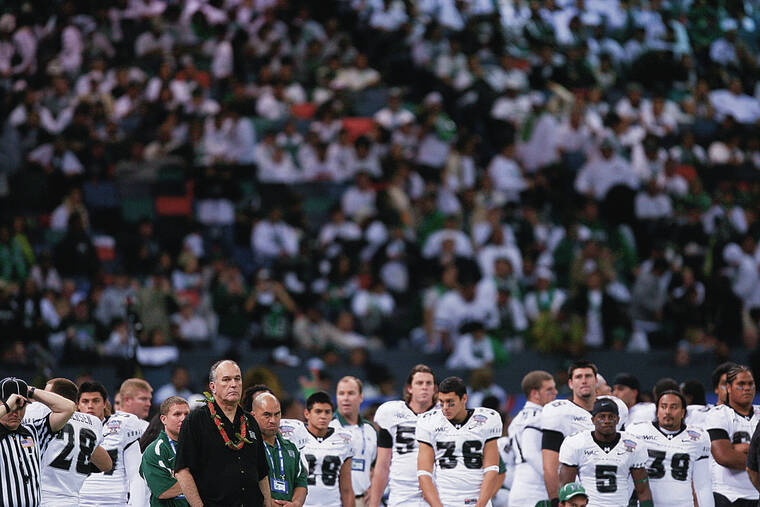 JAMM AQUINO / 2008
                                June Jones turned the University of Hawaii’s football program around after replacing Fred von Appen as UH’s head coach in 1999. Jones led the team to the Allstate Sugar Bowl in New Orleans in 2008, where the Georgia Bulldogs handed Hawaii its first loss of that season 41-10.