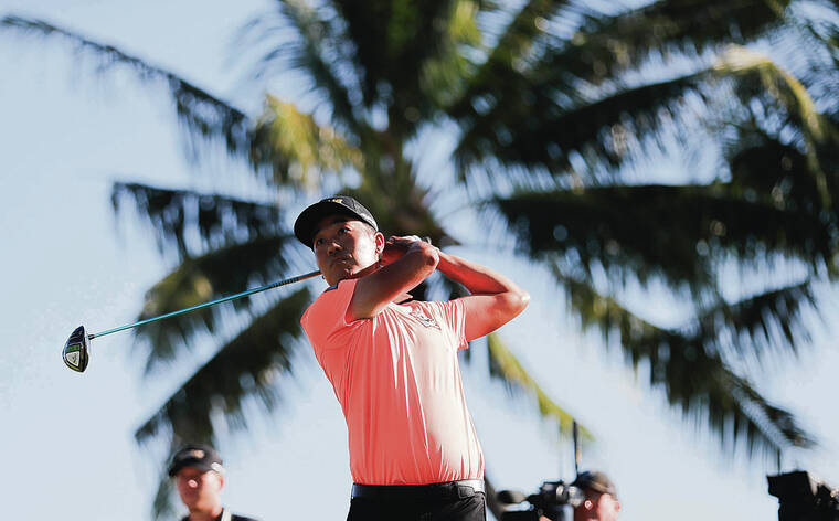 JAMM AQUINO / JAQUINO@STARADVERTISER.COM
                                Kevin Na hit from the 13th tee during the first round of the Sony Open on Thursday at Waialae Country Club.