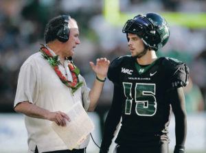 Star-Advertiser / 2007
                                UH coach June Jones discussed strategy with quarterback Colt Brennan against Boise State at Aloha Stadium.