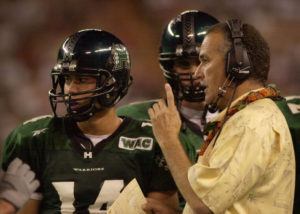 STAR-ADVERTISER FILE
                                June Jones talks with Timmy Chang during a game in 2002.