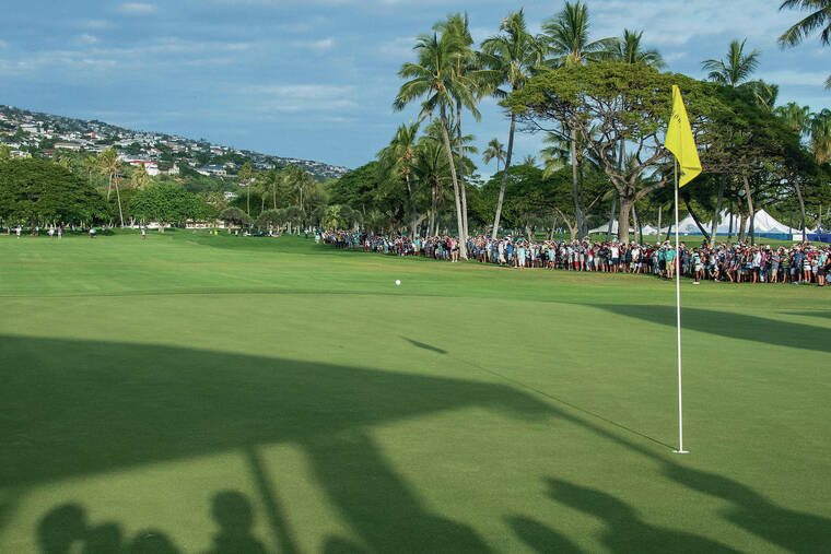 CRAIG T. KOJIMA / CKOJIMA@ STARADVERTISER.COM
                                On the first play-off hole, Hideki Matsuyama’s second shot lands on the green and lands 3 feet away to win Sony Open 2022. Matsuyama bested Russell Henley on the first extra hole.