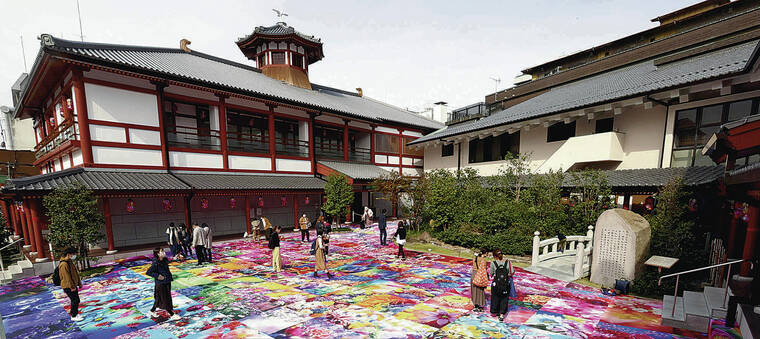 JAPAN NEWS-YOMIURI
                                <strong>SPRINGTIME IN THE WINTER</strong>: Visitors to a hot spring hotel in Matsuyama are treated to a unique exhibition by well-known photographer Mika Ninagawa, whose vibrant works of colorful flowers are laid out across the 3,230-square-foot courtyard at the Dogo Onsen Annex. The exhibit comprises about 230 photos of brilliant roses, dahlias and other flowers, each measuring about 10-1/2 square feet. “I could feel the overflowing energy of life, and it left me refreshed,” a 47-year-old visitor said with a smile.”