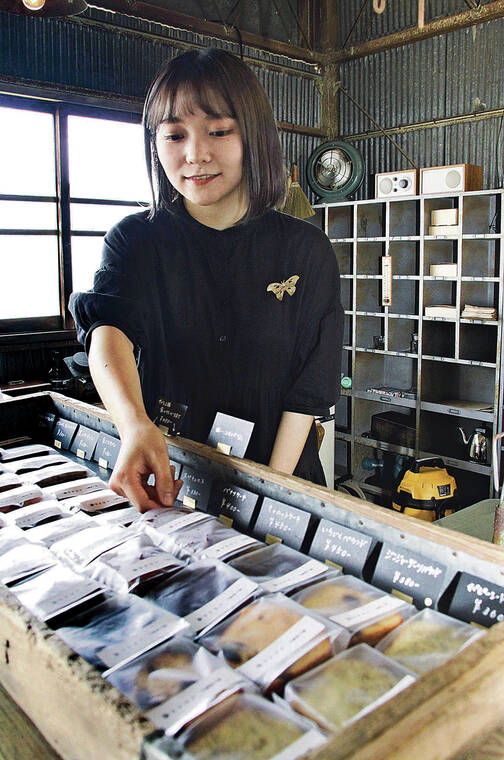 JAPAN NEWS-YOMIURI
                                Kanna Osawa puts out homemade pound cakes and cookies containing powdered crickets at her shop in Maebashi. The store also offers baked goods without the added insects.