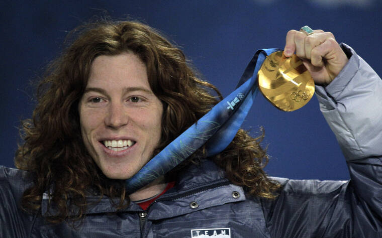 ASSOCIATED PRESS / 2010
                                American gold medalist Shaun White reacts during the men’s halfpipe medal ceremony at the Vancouver Olympics on Feb. 18, 2010.