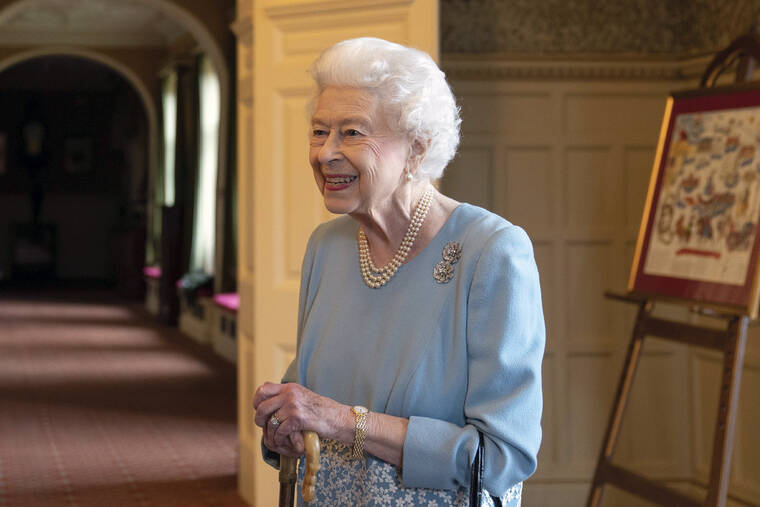 POOL PHOTO / AP
                                Britain’s Queen Elizabeth II attends a reception to celebrate the start of the Platinum Jubilee, at Sandringham House, her Norfolk residence, in Sandringham, England, Saturday.