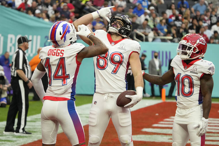 ASSOCIATED PRESS
                                AFC tackle Mark Andrews (89), of the Baltimore Ravens, reacts with wide receiver Stefon Diggs (14), of the Buffalo Bills, and wide receiver Tyreek Hill (10), of the Kansas City Chiefs, after Andrews scored a touchdown in the first half of the Pro Bowl NFL football game against the NFC today in Las Vegas.
