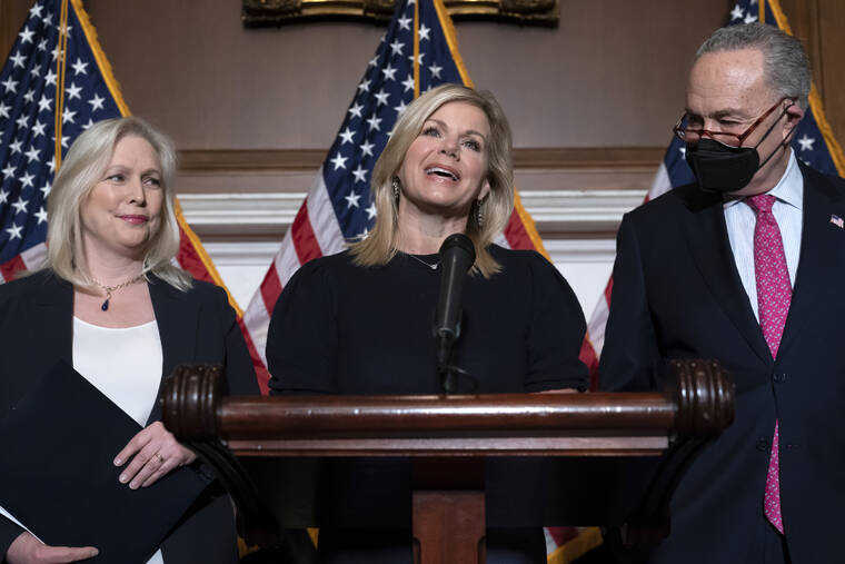 ASSOCIATED PRESS
                                Former Fox News anchor Gretchen Carlson, center, celebrates with Sen. Kirsten Gillibrand, D-N.Y., left, and Senate Majority Leader Chuck Schumer, D-N.Y., after Congress gave final approval to legislation guaranteeing that people who experience sexual harassment at work can seek recourse in the courts, during a news conference at the Capitol in Washington. Since her 2016 sexual harassment lawsuit against then-Fox News Chairman and CEO Roger Ailes, Carlson has worked to ban non-disclosure agreements and forced arbitration clauses in employment agreements to prevent victims of sexual harassment from being silenced.