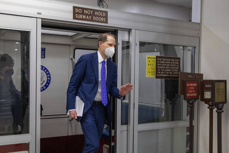 ASSOCIATED PRESS / JAN. 19
                                Sen. Ron Wyden, D-Ore., leaves the senate subway at the Capitol in Washington.